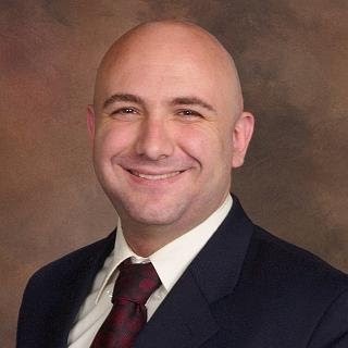 Portrait of David Welker, Attorney at Law, dressed in professional attire